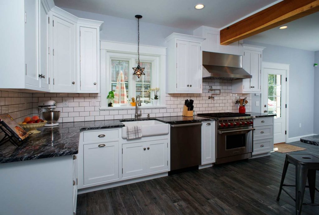 Traditional white kitchen in Allentown Pennsylvania with beveled inset cabinetry and subway tiles, Morris Black Designs