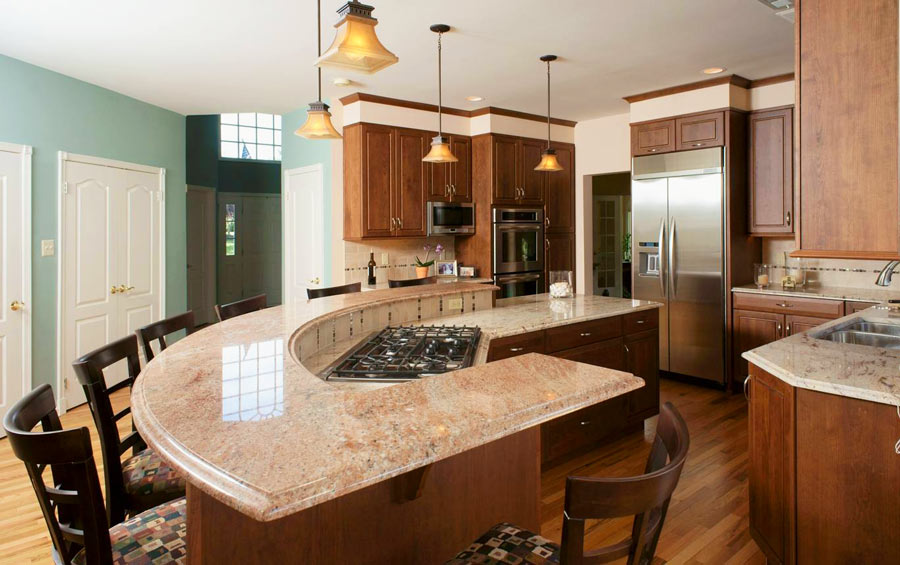 beautiful transitional cherry kitchen with granite curved countertop designed by morris black designs in Allentown pennsylvania