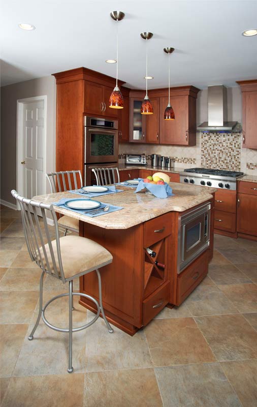 shaker style cabinetry featured in open cherry kitchen designed by morris black designs in Bethlehem pa