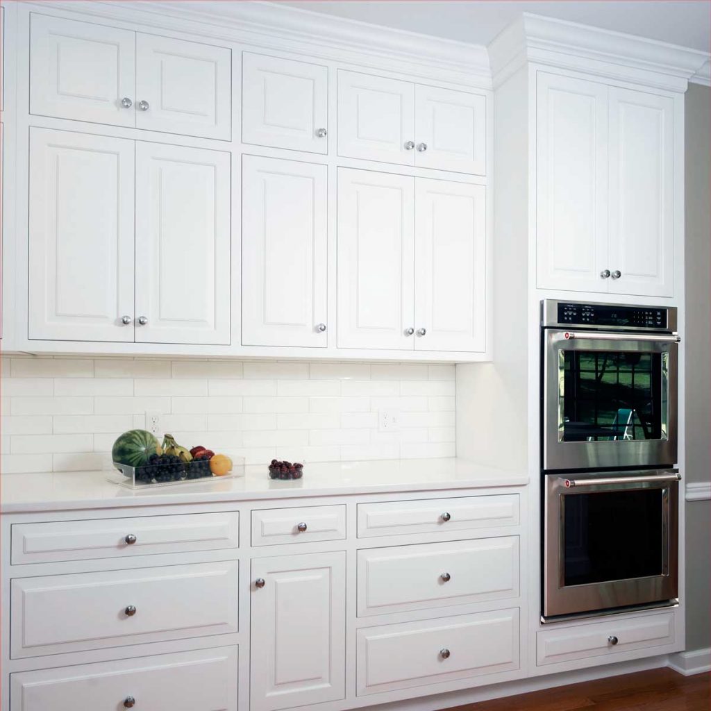 white kitchen cabinets with a subway tile backsplash in allentown pa